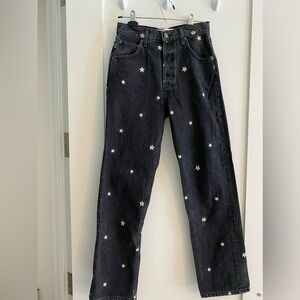 Reformation black straight leg jeans with embroidered daisies. Size 25